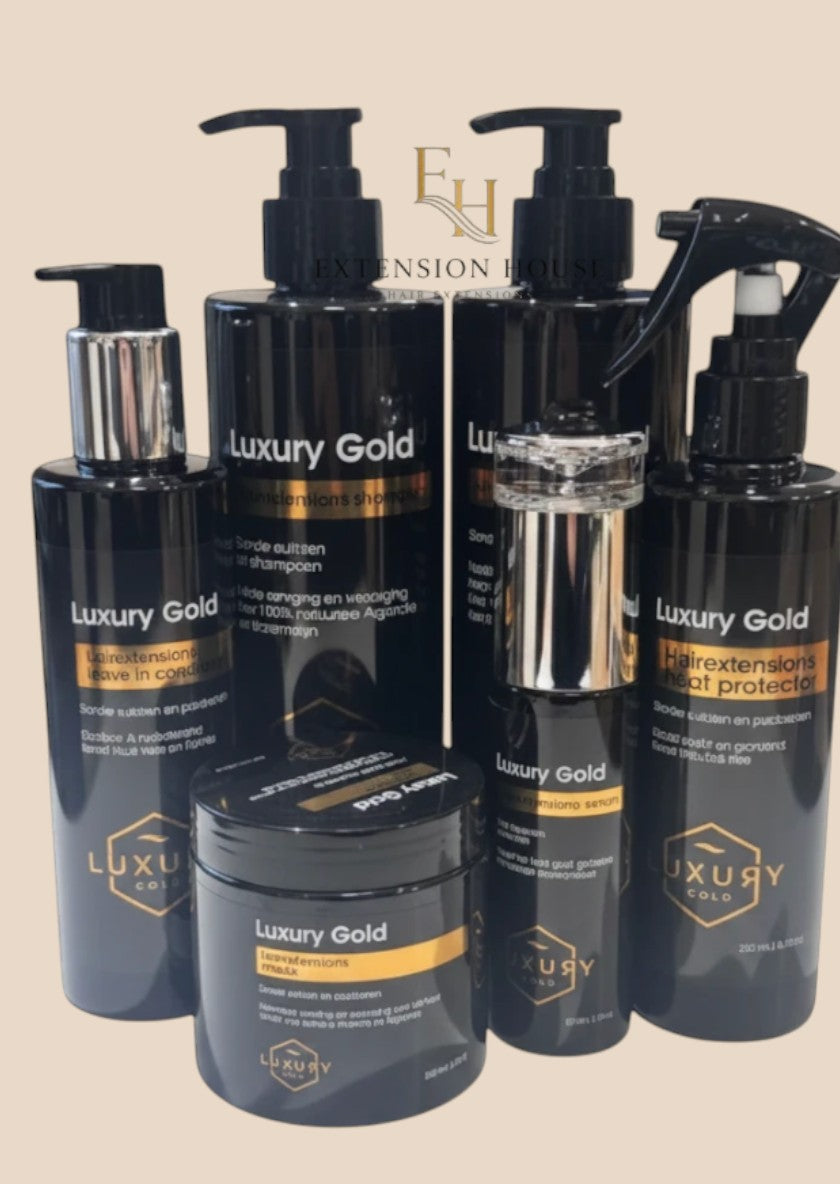 Extension house Luxury Gold 6-delige haarverzorgingsset voor extensions in zwarte flacons met gouden details.