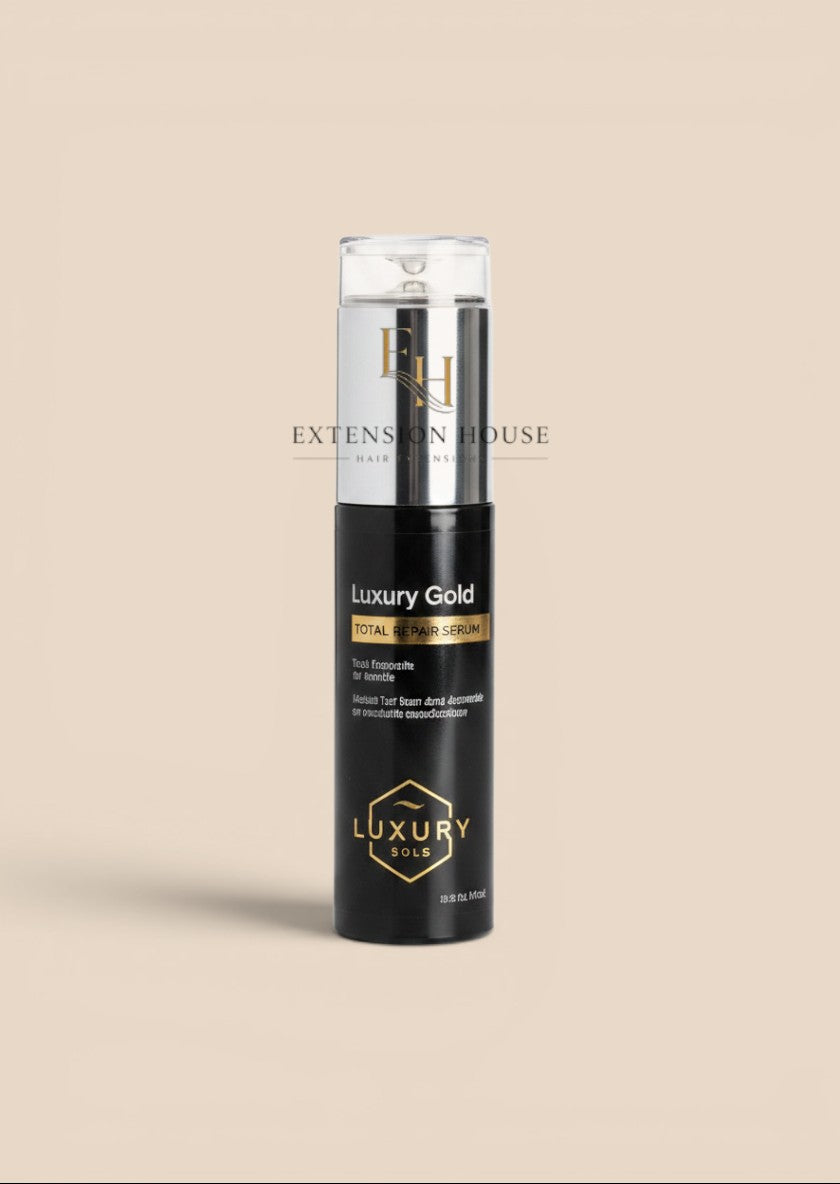 Extension house Luxury Gold hairextensions serum in een zwarte 60ml fles met arganolie voor glanzend haar.