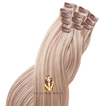 Extension house clip-in extensions van 100% human hair in warm blond met highlights voor extra volume en lengte.
