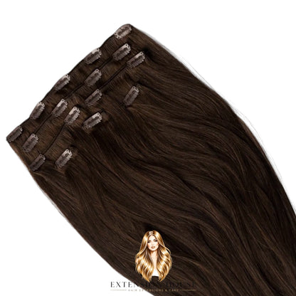 Extension house clip-in extensions in donkerbruin gemaakt van 100% Remy human hair voor extra volume en lengte.