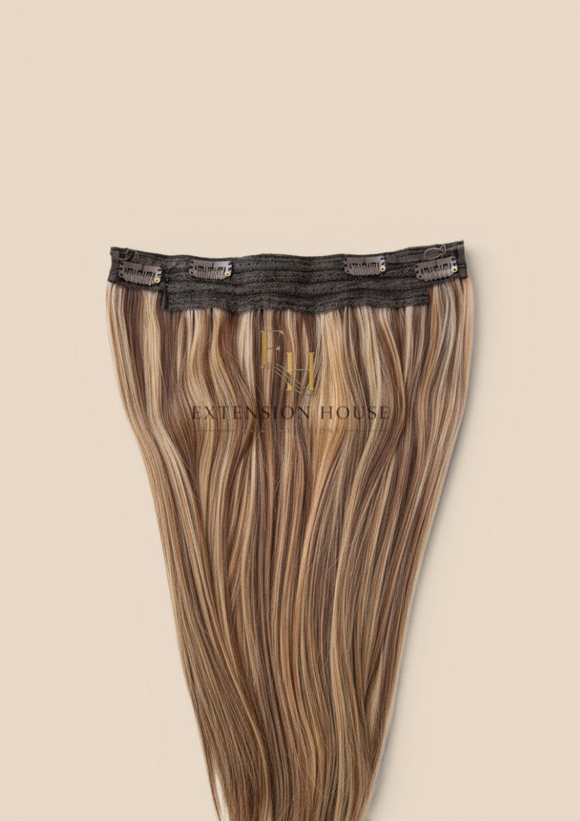 Extension house Halo Flip In extensions in chocoladebruin en honingblond mix van 100% human hair met clips.
