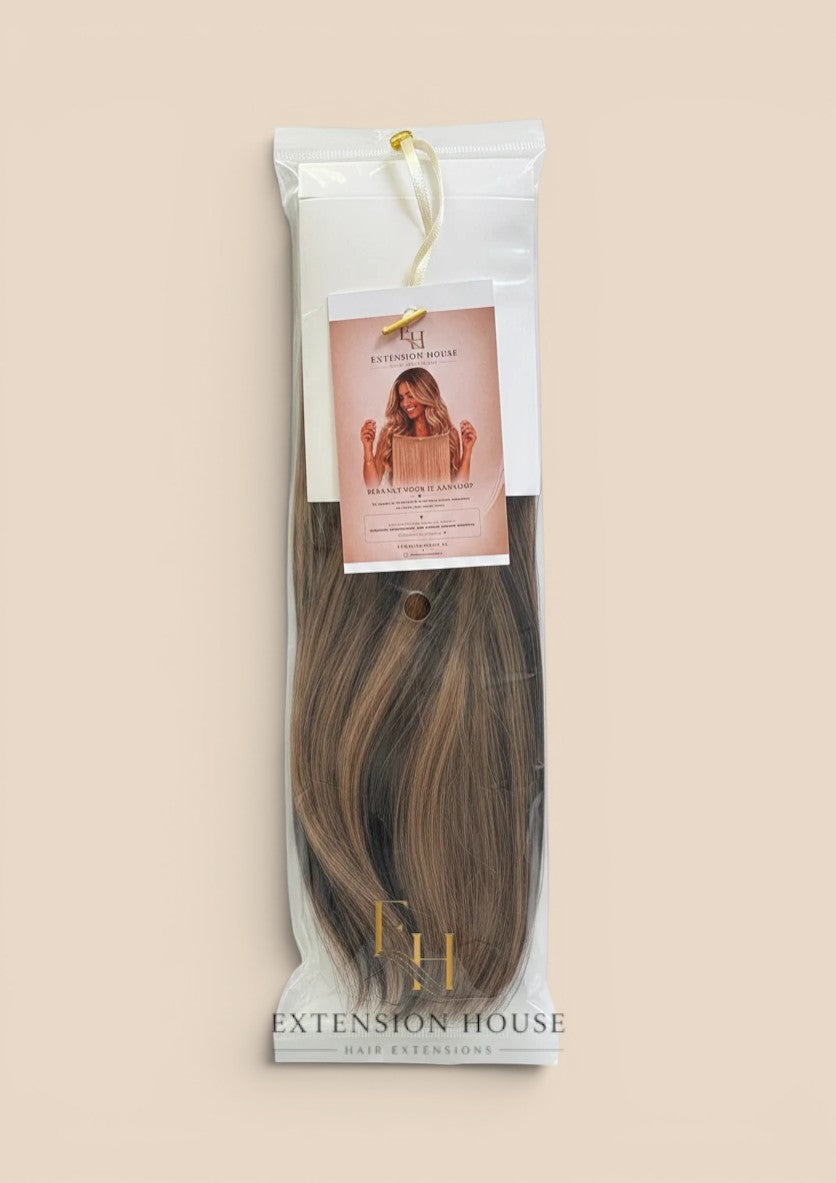 Extension house Halo Flip In Extensions in chocolade bruin en honing blond mix van 100% human hair in verpakking.