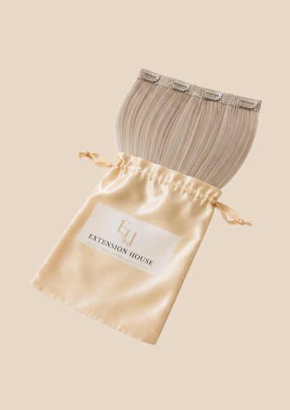 Extension house Halo Flip In Extensions in lichtblond highlight mix van 100% human hair met clips en satijnen zakje.