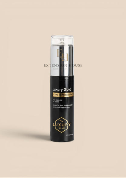 Extension house Luxury Gold hairextensions serum in een zwarte 60ml fles met arganolie voor glanzend haar.