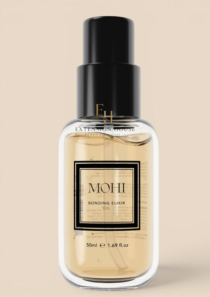 Extension house MOHI Bonding Elixir haarolie in een glazen flesje van 50ml voor glanzend en hersteld haar.