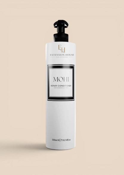 MOHI herstellende conditioner van Extension house in witte pompflacon voor intensief herstel van beschadigd haar