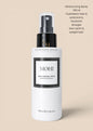 MOHI Hydraterende Haarverzorgingsspray van Extension house in witte 100ml fles voor glanzend en pluisvrij haar.