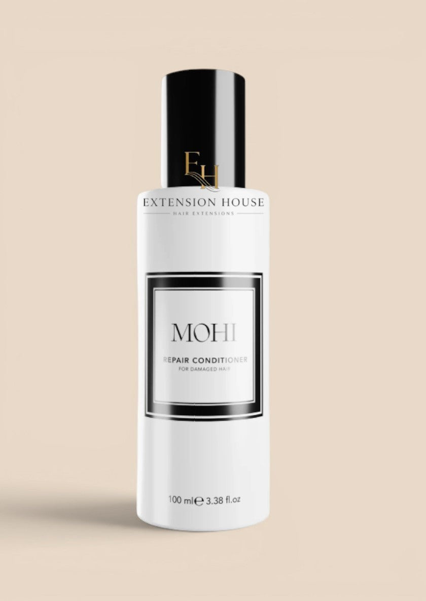 Extension house MOHI Repair Conditioner in een witte fles van 100ml voor intensief herstel van beschadigd haar.