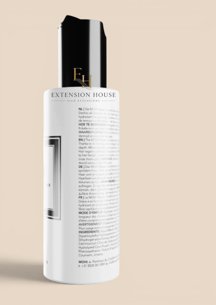 Extension house Mohi Repair Conditioner voor beschadigd haar, 100 ml fles met zwarte dop.