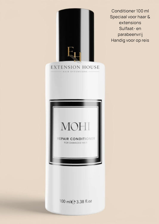 Extension house Mohi Repair Conditioner voor beschadigd haar, 100 ml fles met zwarte dop.
