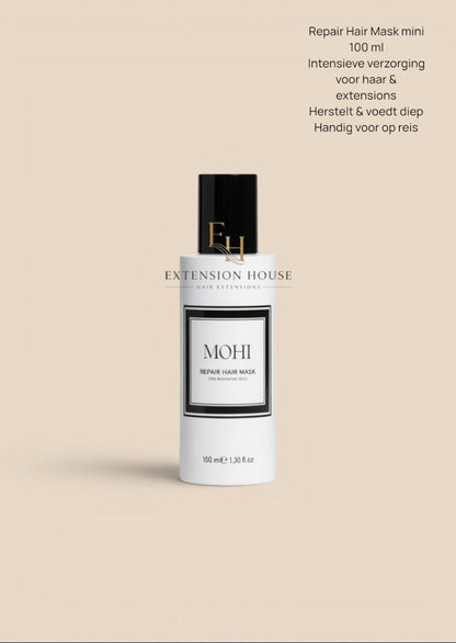 Extension House Mohi Repair Haarmasker voor beschadigd haar, 100 ml. Witte fles met zwarte dop en label.