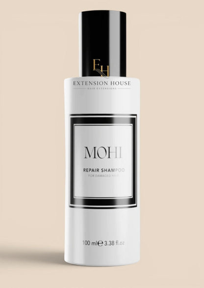 Extension house MOHI Repair Shampoo in een witte fles van 100ml voor herstel van beschadigd haar en extensions.