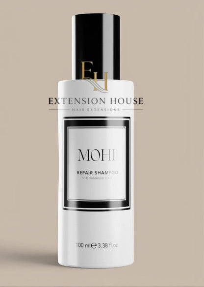Extension house Mohi Repair Shampoo voor beschadigd haar, 100 ml fles met zwart-wit label en zwarte dop.