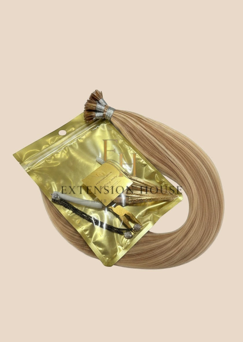 Extension House nanoring extensions in ash blonde highlight blend, 100% human hair, met nanoring applicatie en tang.