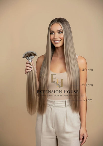 Extension House nanoring extensions in assig blonde highlight blend, lang en volume voor een natuurlijke look.