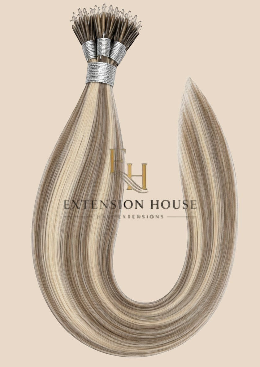 Extension House nanoring extensions van 100% echt haar met highlights in blond en bruin, voor extra lengte en volume.