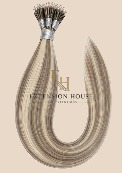 Extension House nanoring extensions van 100% echt haar met highlights in blond en bruin, voor extra lengte en volume.