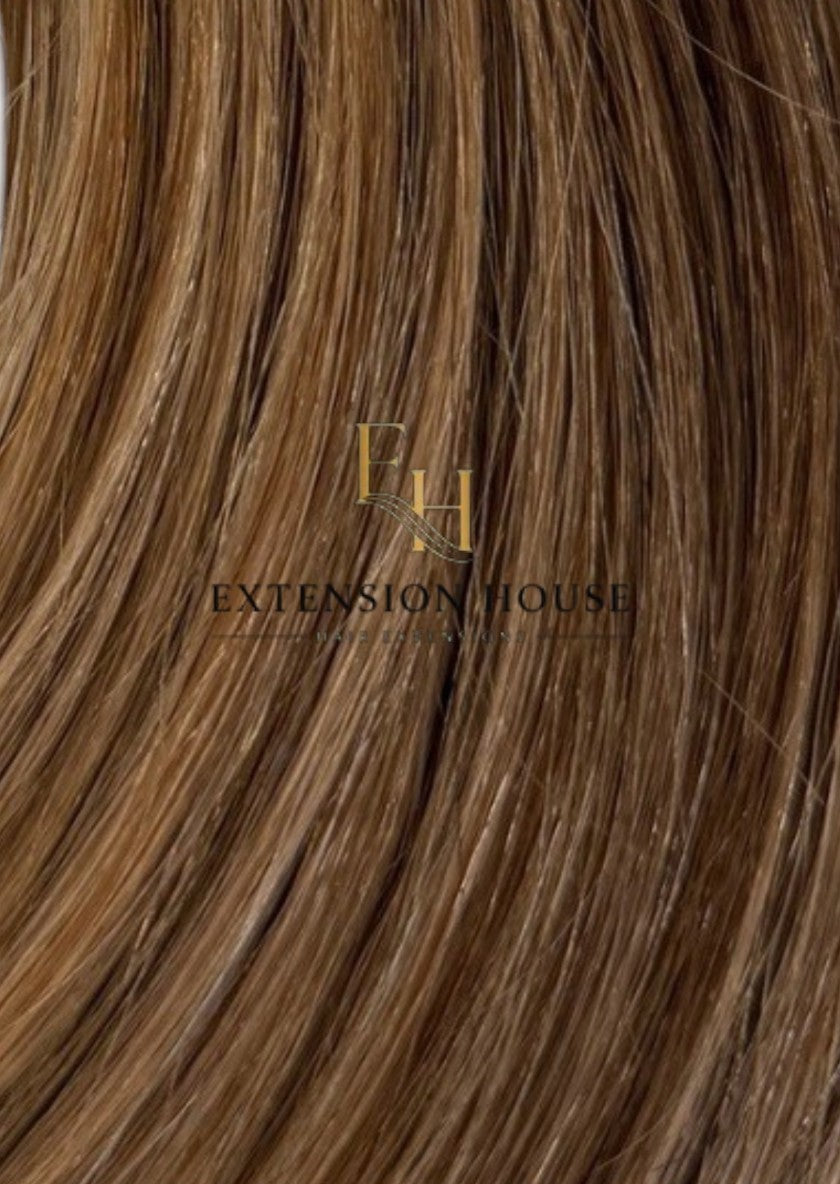 Extension House nanoring extensions van 100% echt haar in warm bruin met highlights, voor extra lengte en volume.