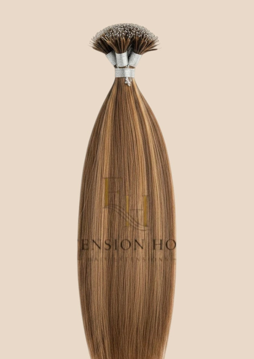 Extension House Nanoring haarstukjes in bruin met highlights, gemaakt van 100% echt haar voor extra lengte en volume.