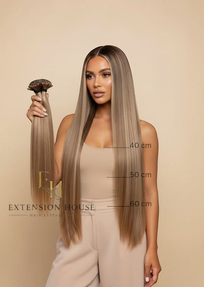 Extension House nanoring extensions van 100% human hair in #6/20 lichtbruin blonde highlight blend, 40-60 cm lang.