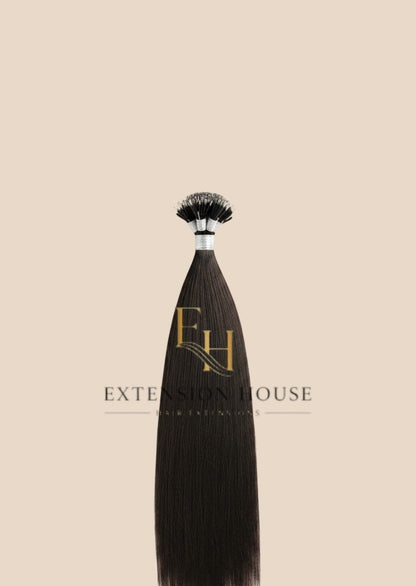 Extension house nanoring extensions van 100% human hair in de kleur #1B Natural Black. Lang, recht haar met fijne nanoring bevestiging.