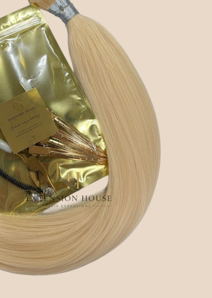Extension House nanoring extensions van 100% human hair in kleur #60 Platinum Blonde, met nanoringen en tang.