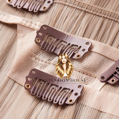Extension house clip-in extensions van 100% human hair in warm blond met highlights en bruine clips