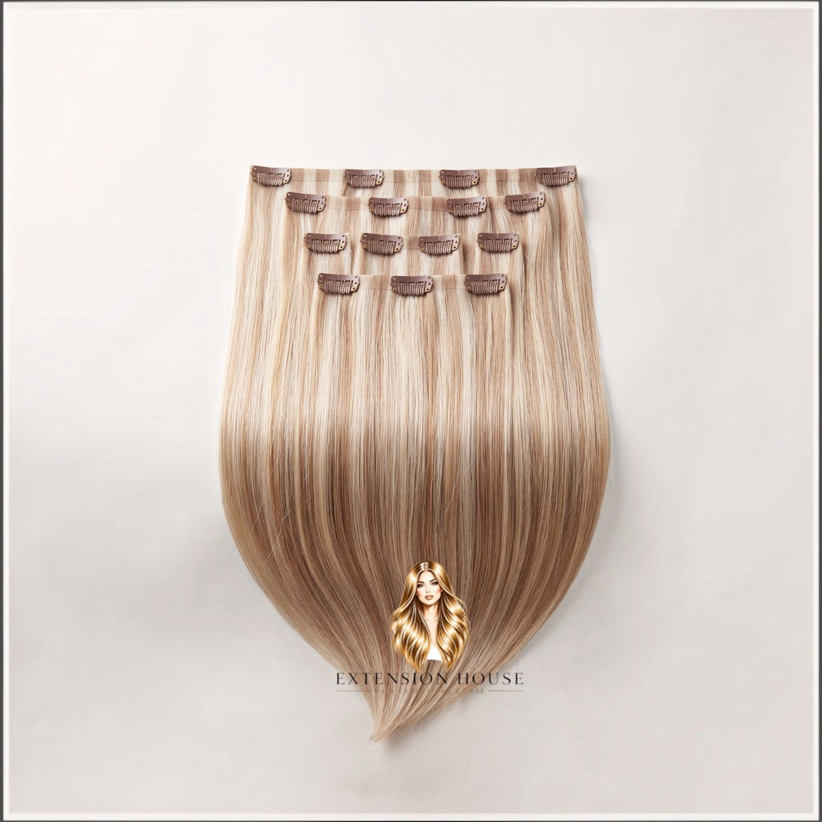 Extension house clip-in extensions van 100% human hair in warm blond met highlights voor extra volume en lengte.