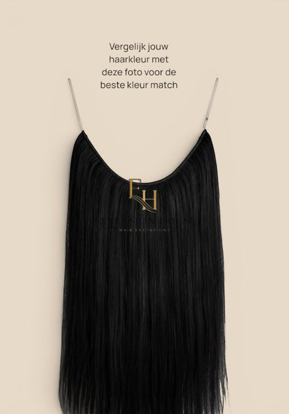 Extension house zwarte flip-in haarverlenging van 100% human hair met transparante draad voor extra volume en lengte.