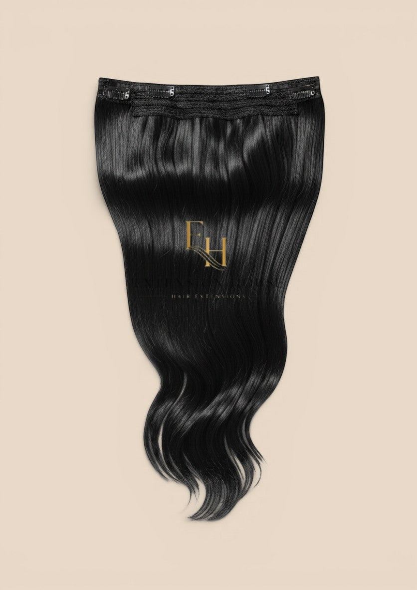 Extension house zwarte 100% human hair flip-in extensions met onzichtbare draad en clips voor extra volume en lengte.